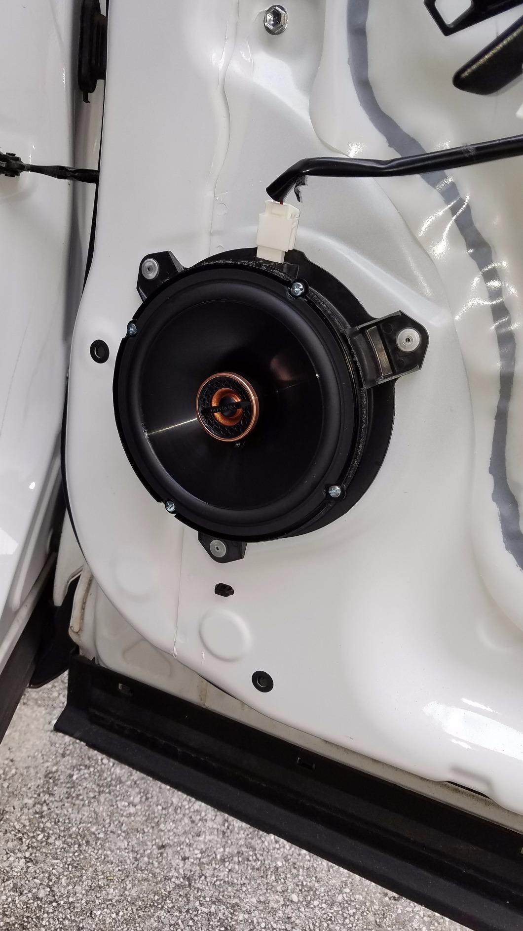 Factory vs aftermarket car speaker comparison at Blackout Window Tinting