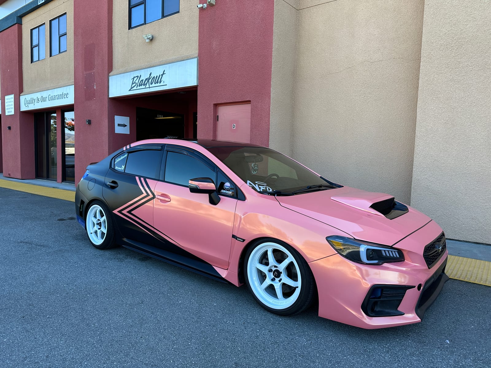 Subaru WRX with custom pink vinyl wrap