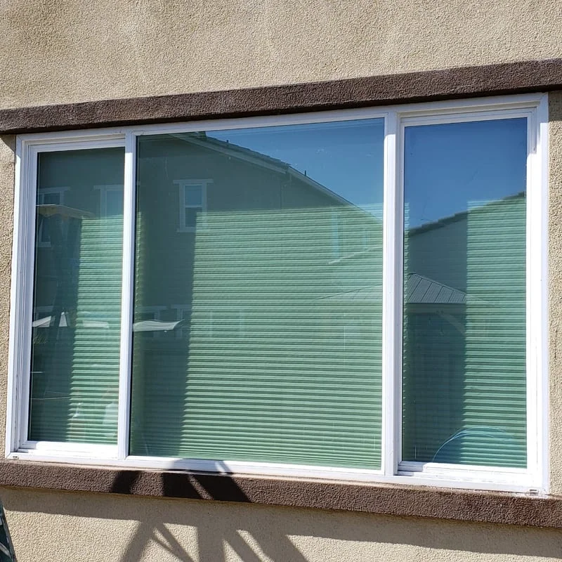 Before - residential window before perforated film installation