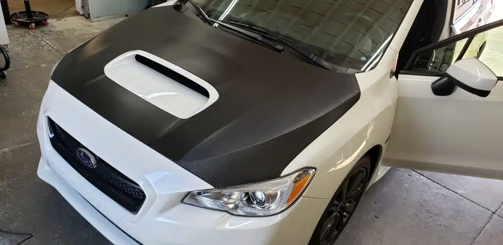 Why Paint is Dead & Car Wraps are the Future 1 Picture of Subaru Carbon Fiber Hood Car Vinyl Wrap completed by Blackout Window Tinting in Gilroy, CA