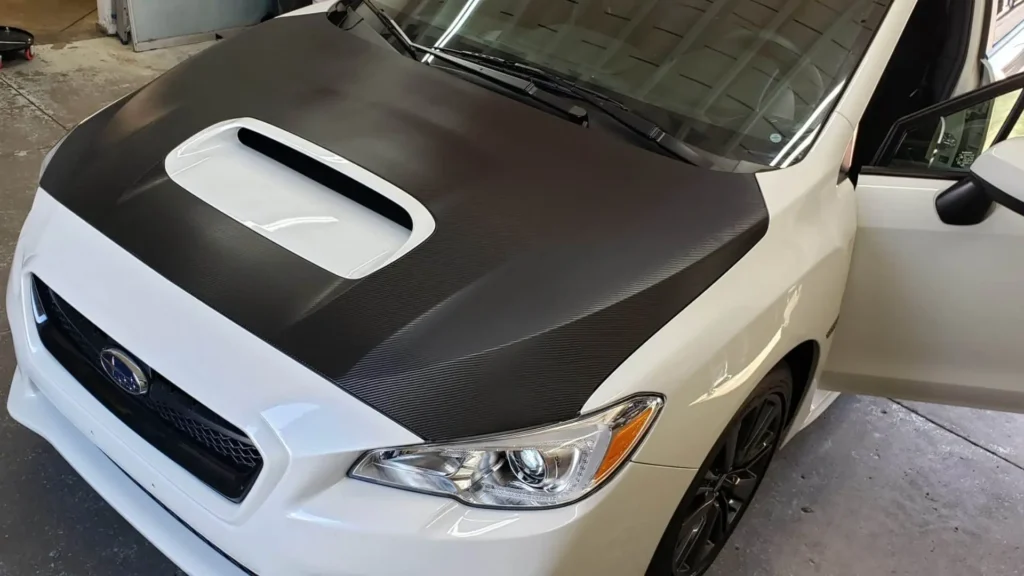 black and white vinyl wrapped car